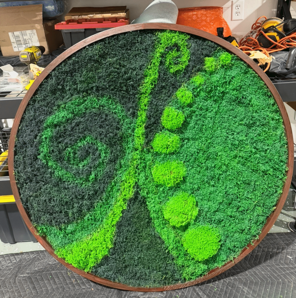 Double sided live moss circle frame with different species of living moss in a unique design.
